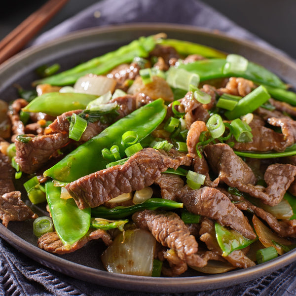 Grass Fed Beef stir-fry strips with tarragon, garlic, ginger and pink pepper (quick frozen, un-aged)